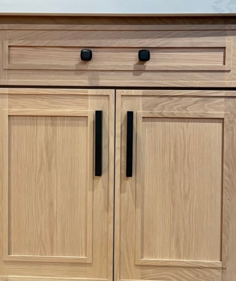 Sleek handle pulls for oak cabinets