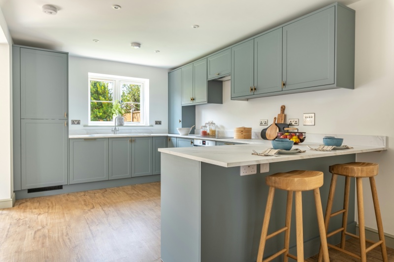 Sleek Blue Matte Frameless Cabinets