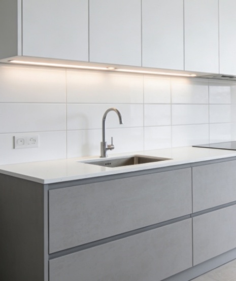 Frameless grey and white cabinetry design