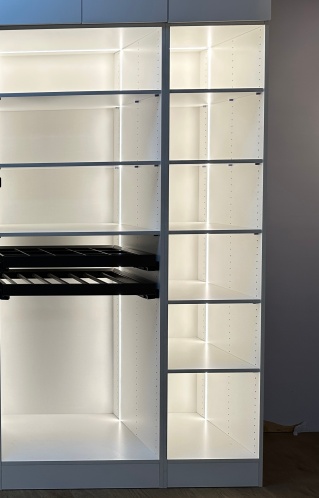 Wooden wardrobe with custom lighting features