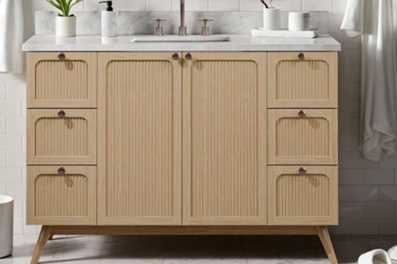 Light oak vanity adds warmth to bathroom