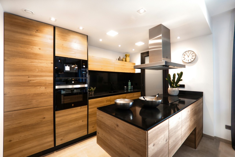 Bespoke kitchen cabinetry showcasing wood knots Bespoke kitchen cabinetry showcasing wood knots