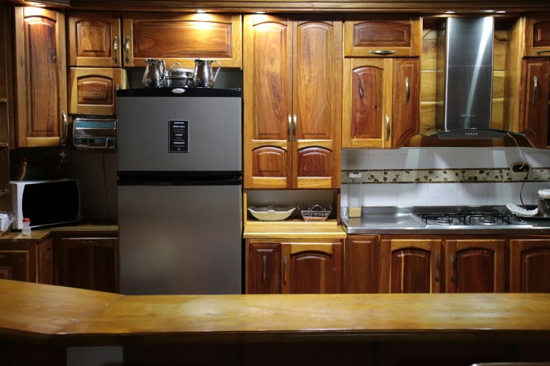 Custom made wooden cabinets with knots Custom made wooden cabinets with knots