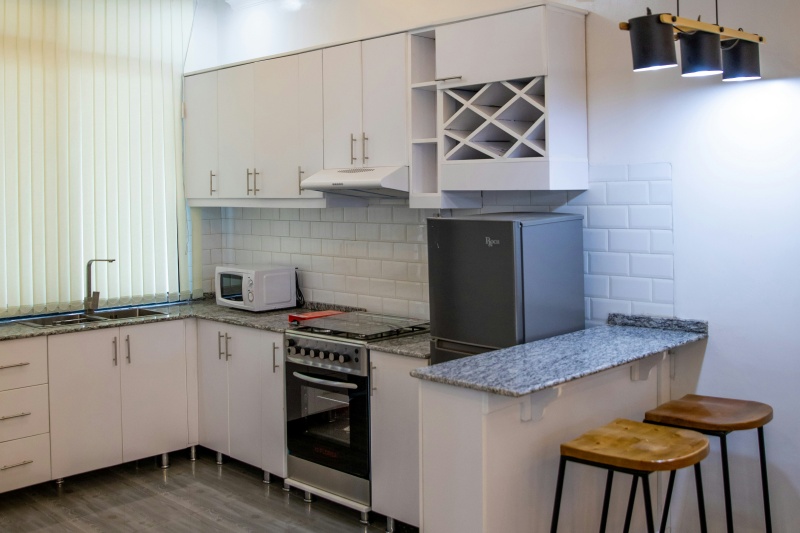 Custom kitchen cabinets with wine storage Custom kitchen cabinets with wine storage
