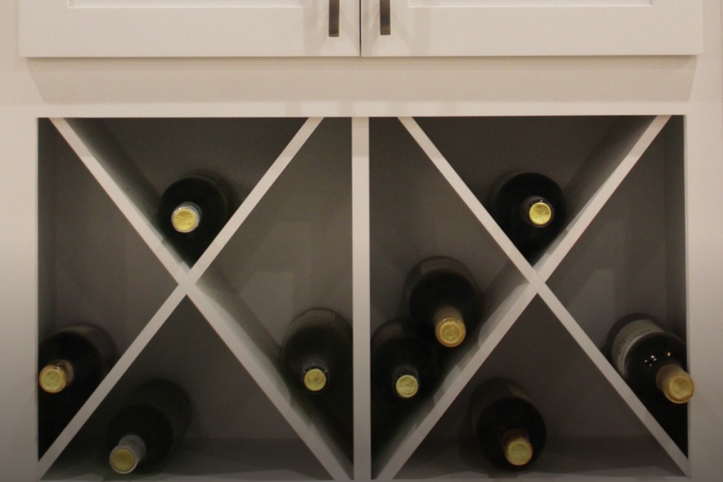 Modern kitchen design with wine rack Modern kitchen design with wine rack
