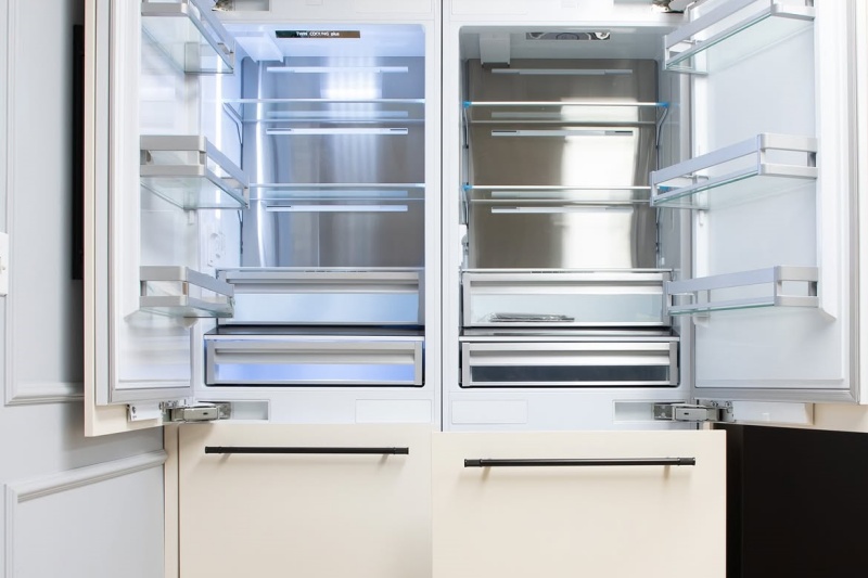 Hidden appliance covers in wooden cabinets Hidden appliance covers in wooden cabinets