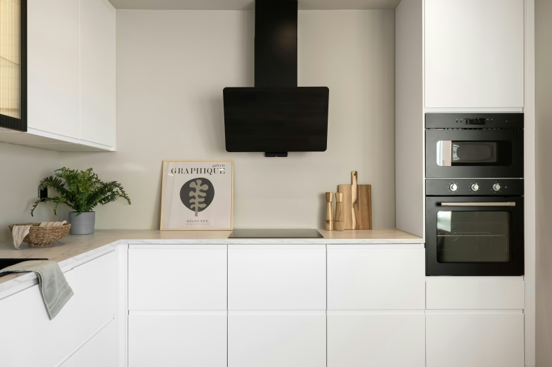 Modern black cabinet handles for white kitchen