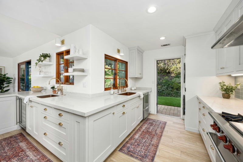 Chic brass knobs for modern white cabinets